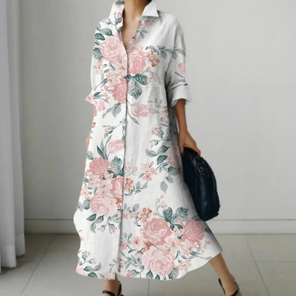 Elegantes Damenkleid mit floralen Rosenmustern, knielang, aus leichtem Stoff. Perfekt für Sommermode, Freizeitkleidung und stilvolle Anlässe.