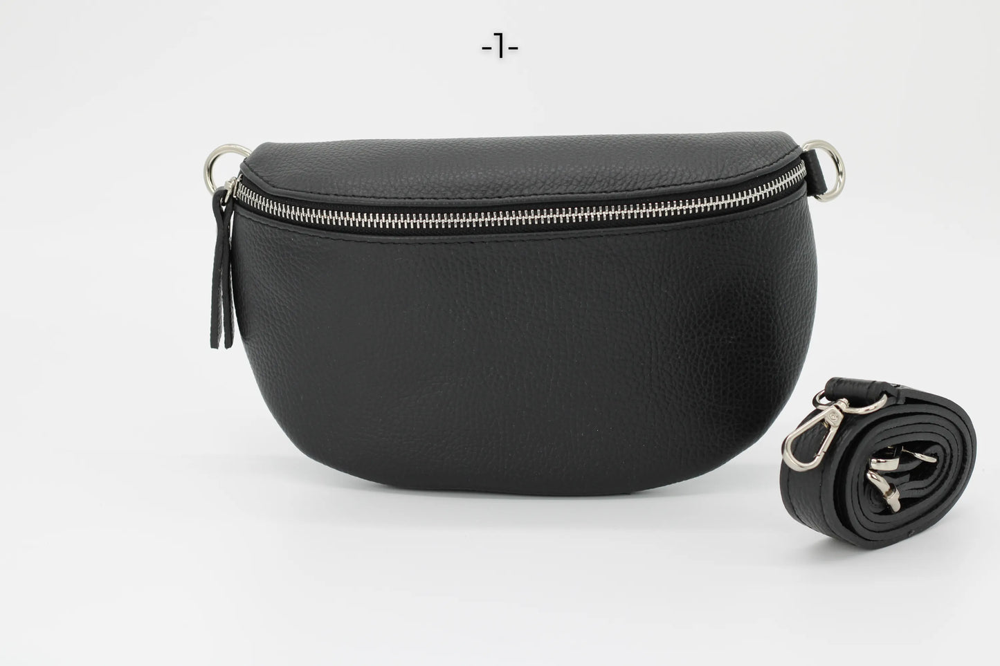 Schwarze Leder-Gürteltasche mit Reißverschluss und abnehmbarem Riemen, ideal für stilvolle Aufbewahrung und praktischen Einsatz.