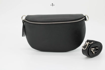 Schwarze Leder-Gürteltasche mit Reißverschluss und abnehmbarem Riemen, ideal für stilvolle Aufbewahrung und praktischen Einsatz.