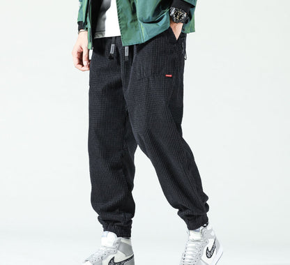 Schwarze Cord-Jogginghose für Herren, lässig, bequem, mit Taschen, modisch, Streetwear.