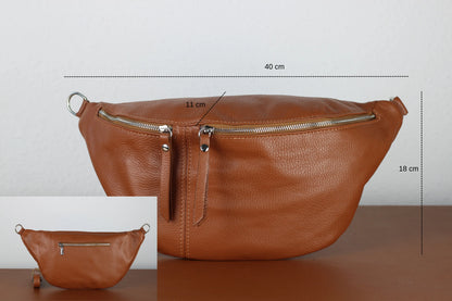 Braune Leder-Gürteltasche mit Reißverschluss, 40 cm breit, 18 cm hoch. Praktisch und stilvoll für Reisen und Alltag. Hochwertige Verarbeitung.