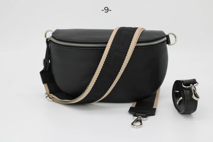 Schwarze Leder-Gürteltasche mit verstellbarem Riemen, Reißverschluss und modernem Design. Perfekt für stilvolle, praktische Aufbewahrung.