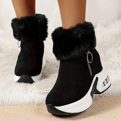 Schwarze Damenstiefeletten mit Kunstfell, Keilabsatz und Reißverschluss. Modische Winterstiefel, bequem und stilvoll für kalte Tage.