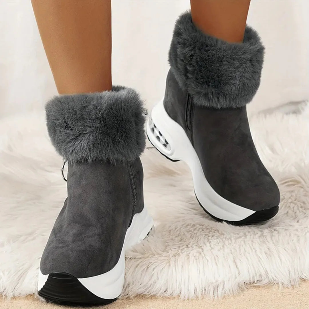 Graue Damen-Winterstiefel mit Kunstfell, rutschfeste Sohle, modisch und warm, ideal für kalte Tage. Perfekte Kombination aus Stil und Komfort.