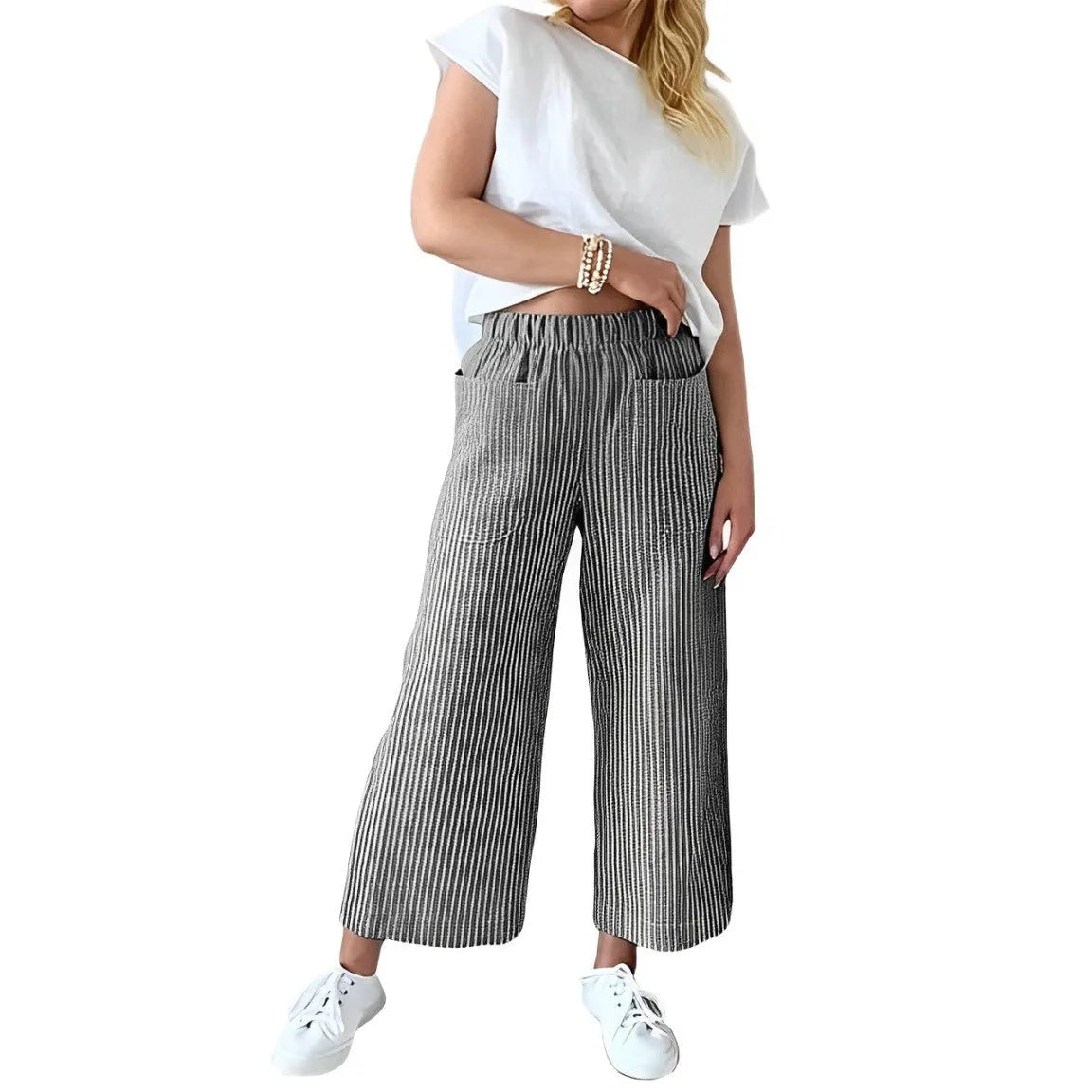 Damenhose mit elastischem Bund, gestreiftem Print, aus Baumwoll-Leinen, lässig und weit geschnitten. Perfekt für Freizeitmode und Komfort.