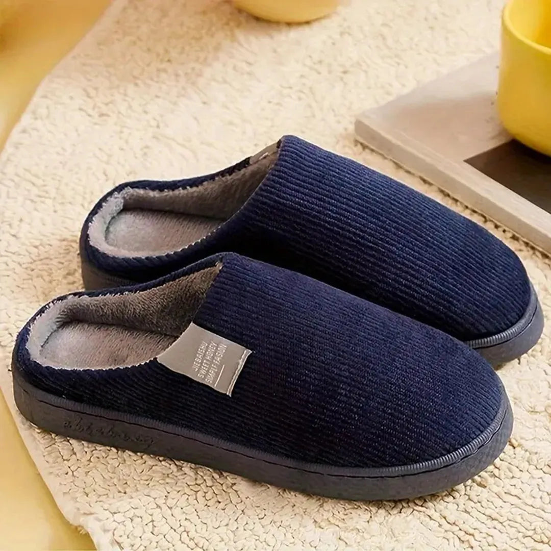 Dunkelblaue Hausschuhe aus Cordstoff, warm gefüttert, ideal für den Winter. Bequeme Pantoffeln für Herren und Damen, rutschfeste Sohle.
