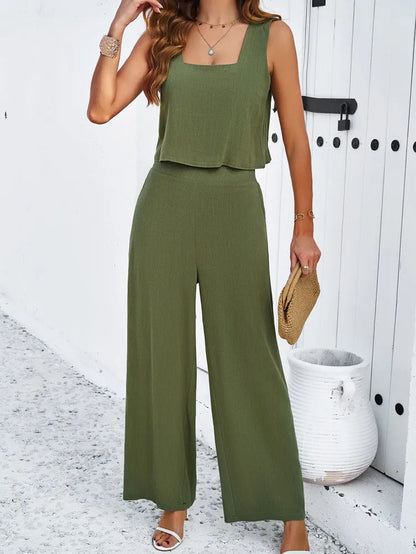 Damen Jumpsuit in Olivgrün, ärmellos, mit weitem Bein. Perfekt für Sommermode, elegant und lässig. Ideal für Strand- oder Freizeitoutfits.