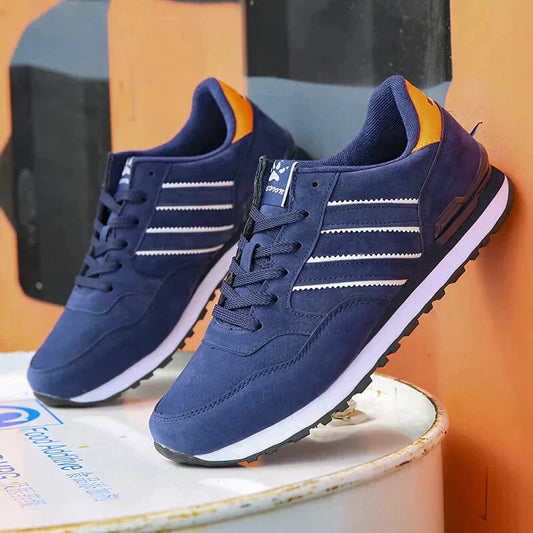 Dunkelblaue Sneaker mit weißen Streifen, ideal für Herren. Bequeme Sportschuhe, modisch und vielseitig. Perfekt für Freizeit und Sport.