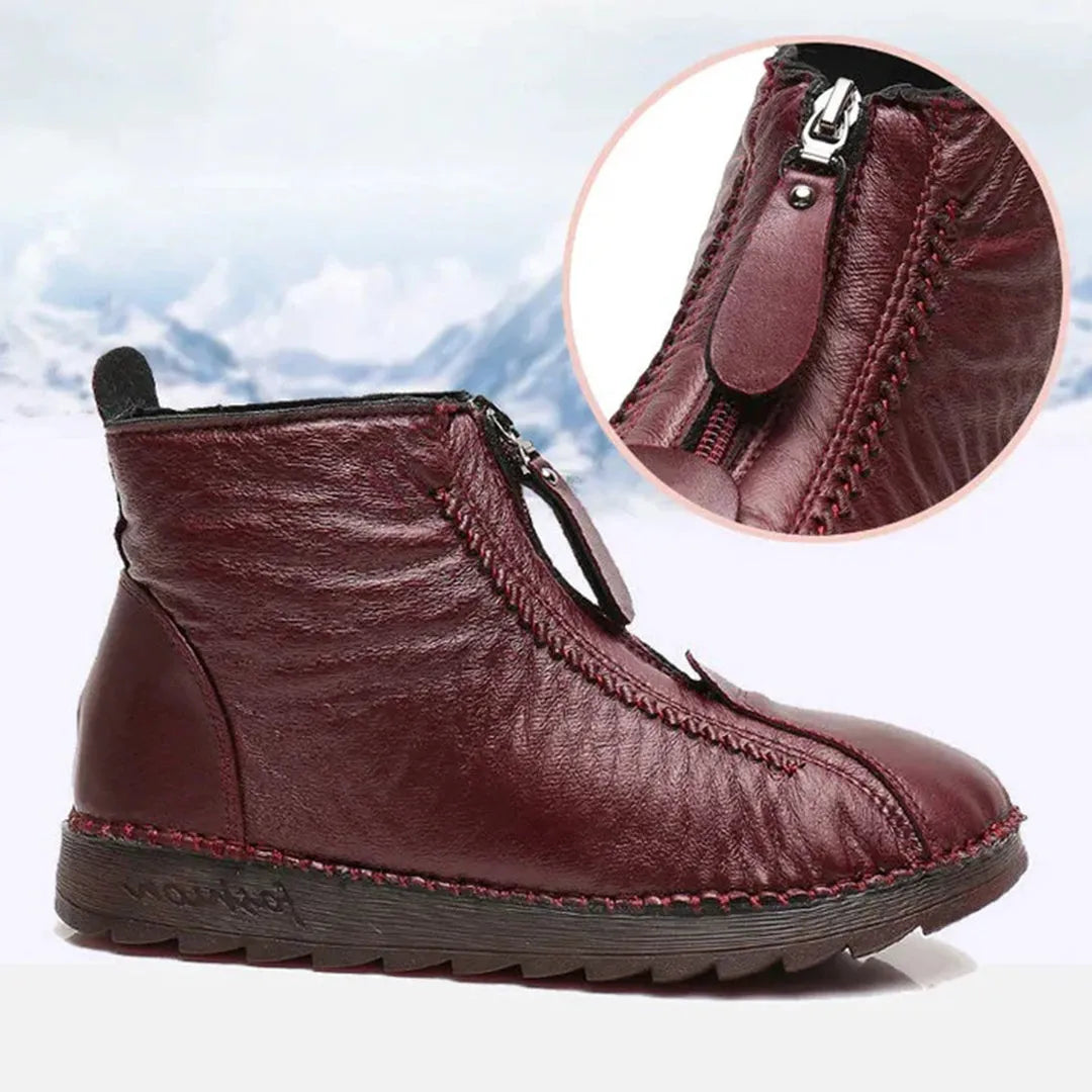 Damen-Winterstiefel aus Leder in Rotbraun, mit Reißverschluss, rutschfester Sohle, warm gefüttert. Perfekt für kalte Tage und Outdoor-Aktivitäten.