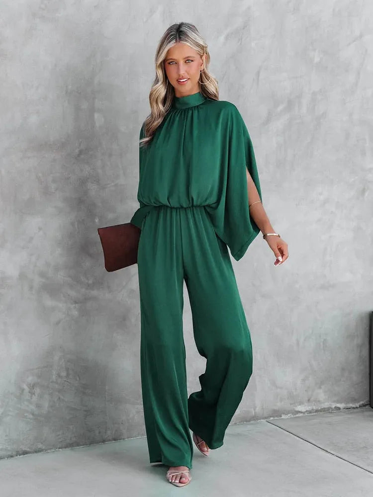 Eleganter grüner Jumpsuit für Damen, ideal für Sommermode. Perfekt für stilvolle Anlässe. Hochwertige Stoffe, modisches Design.