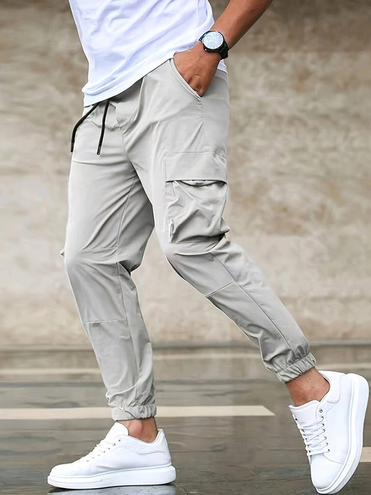 Beige Cargohose Herren, lässig, mit Taschen, elastischer Bund, ideal für Freizeitmode.
